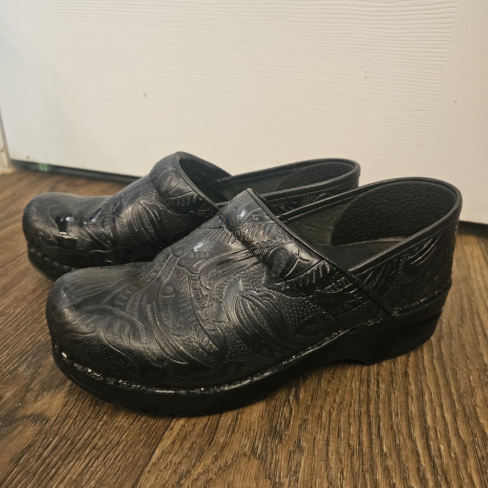 Dansko Black Mules with Textured Leather and Supportive Sole
